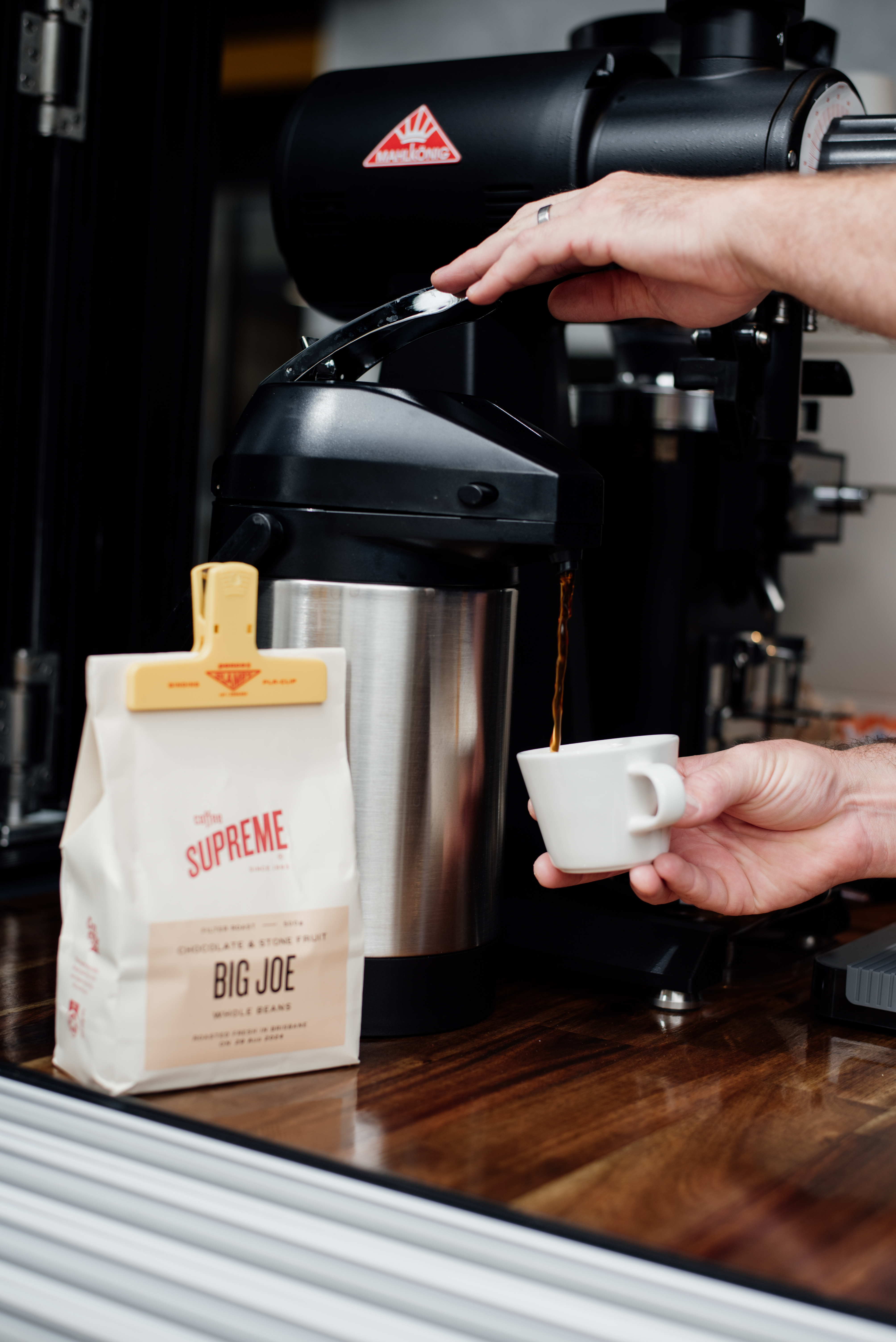 Pouring Coffee Supreme Big Joe blend at Boxboy Coffee